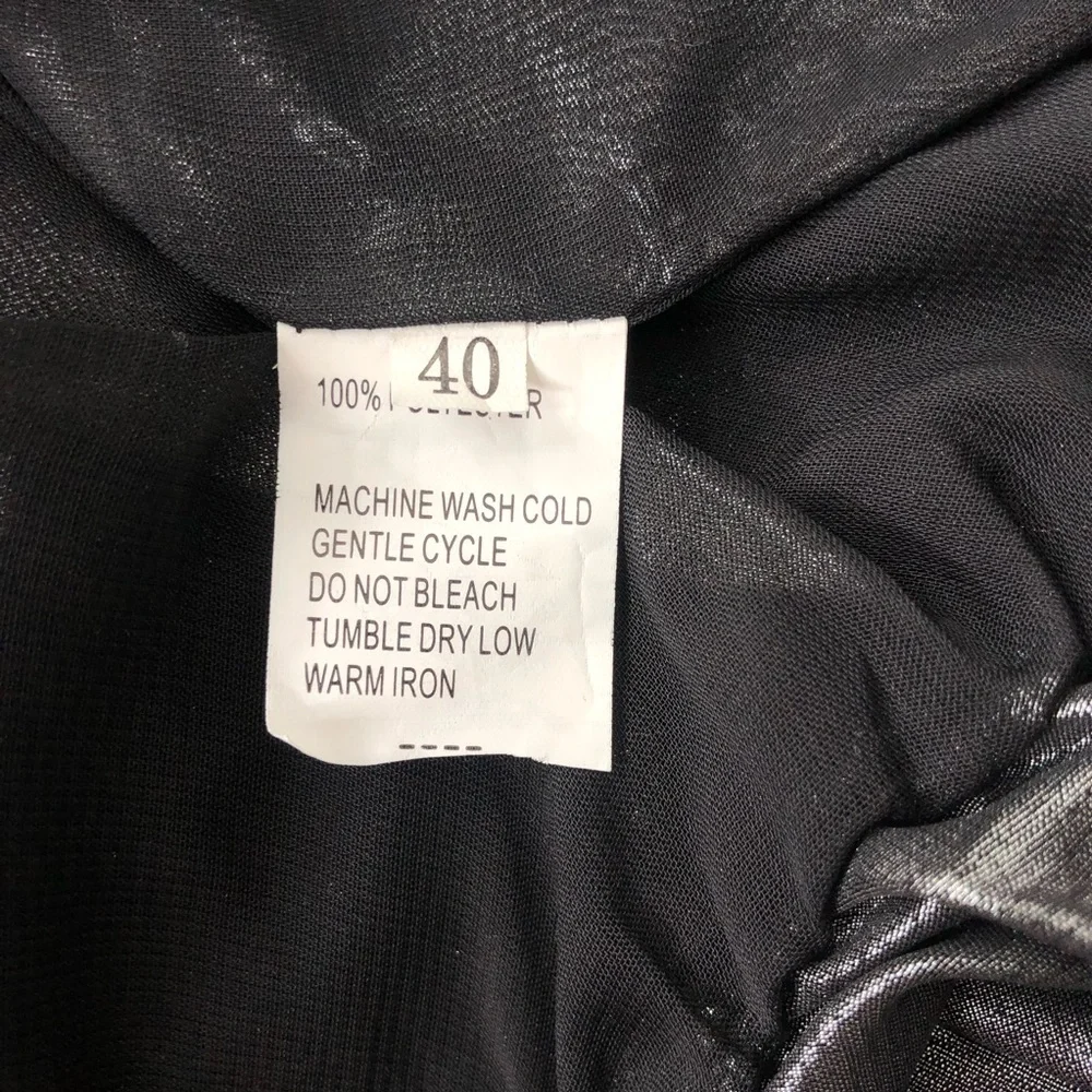 A. Nita Charcoal Metallic Top